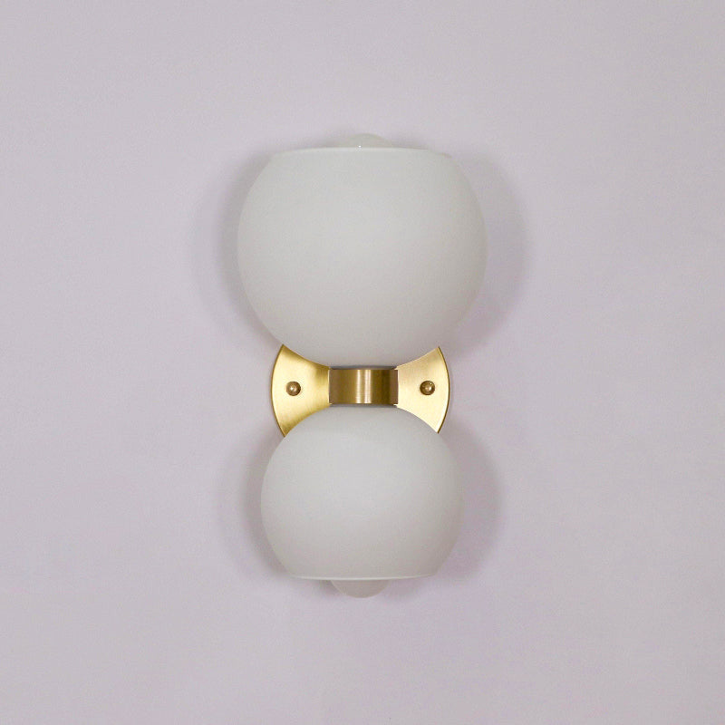 round-white-glass-bedroom-wall-lamp