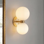 round-white-glass-bedroom-wall-lamp