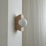 neptune-travertine-wall-lamp