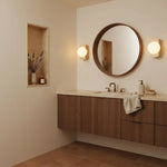 robin-minimalist-travertine-opaline-glass-globe-wall-sconce
