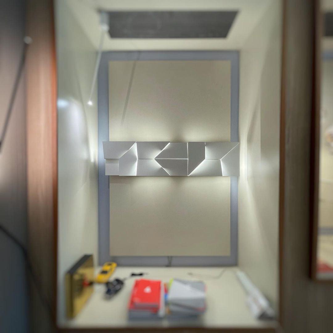 Shadows Charging Grand Sconce