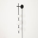 Vertical Globe Plug In Wall Lamp