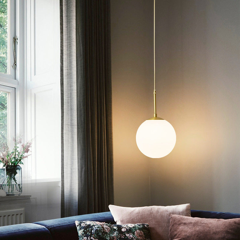 white-frosted-glass-brass-pendant-light-202gpl