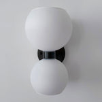 round-white-glass-bedroom-wall-lamp