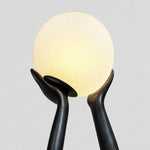 hermes-modern-minimalist-resin-lady-sculpture-sphere-glass-shade-floor-light