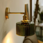 shiny-green-glass-cylinder-led-wall-light-in-art-deco-style