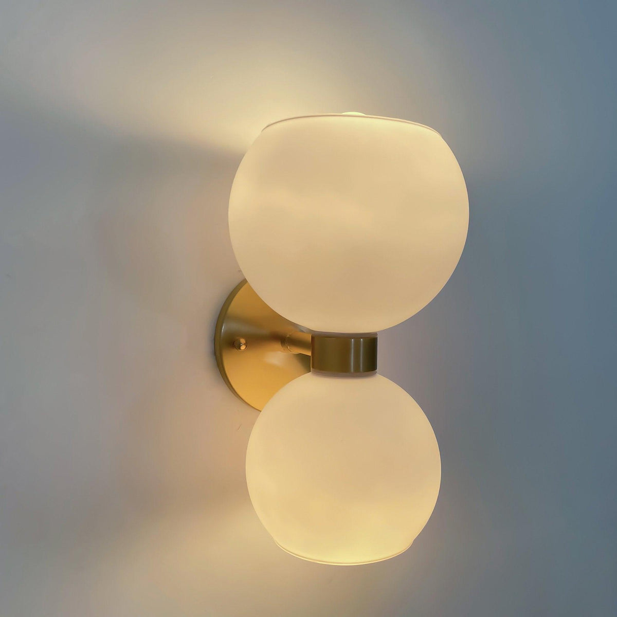 round-white-glass-bedroom-wall-lamp