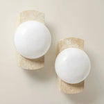 robin-minimalist-travertine-opaline-glass-globe-wall-sconce
