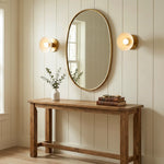 contemporary-1-light-round-brass-wall-light