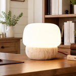 solenne-minimalist-mushroom-travertine-table-light