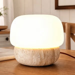 solenne-minimalist-mushroom-travertine-table-light