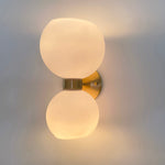 round-white-glass-bedroom-wall-lamp