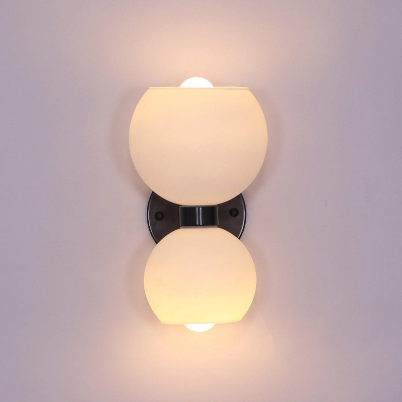 round-white-glass-bedroom-wall-lamp